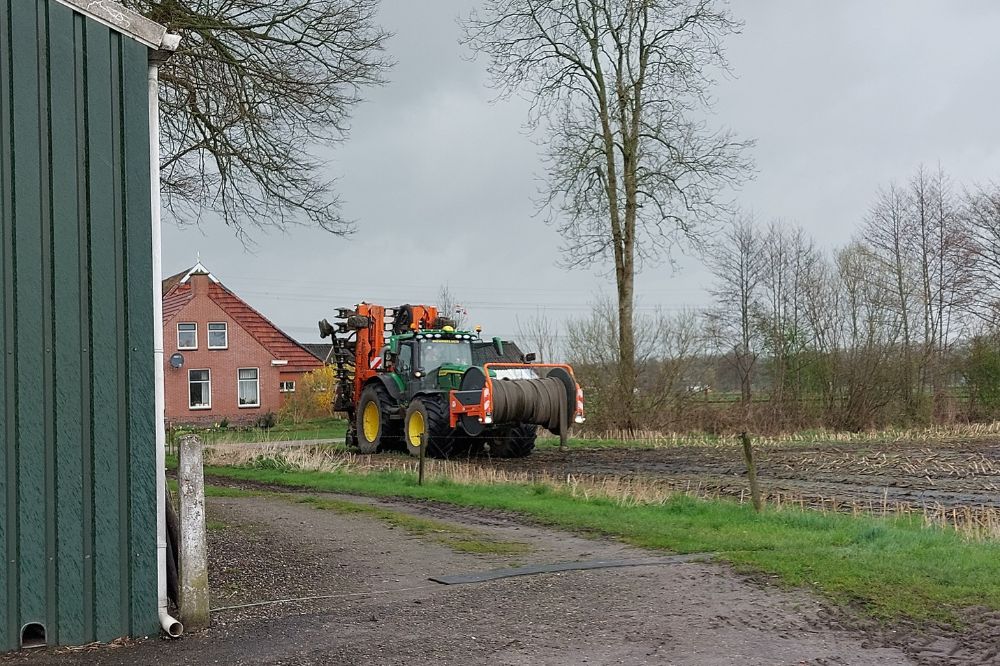 John Deere 6R-serie trekt de sleepslang